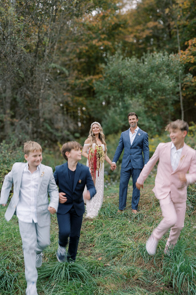 Family taking photos on their land in Rochester during their wedding.